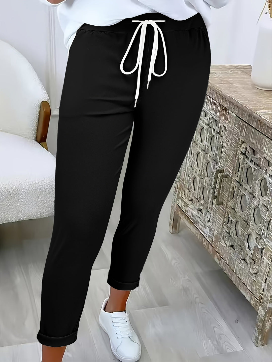 MODERNE BROEK MET TREKKOORD VOOR VROUWEN