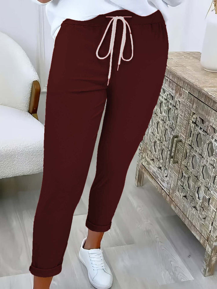 MODERNE BROEK MET TREKKOORD VOOR VROUWEN